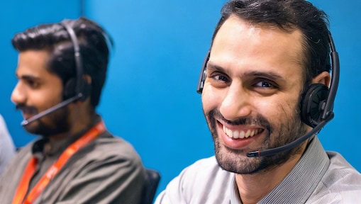 Employees using computers in an office