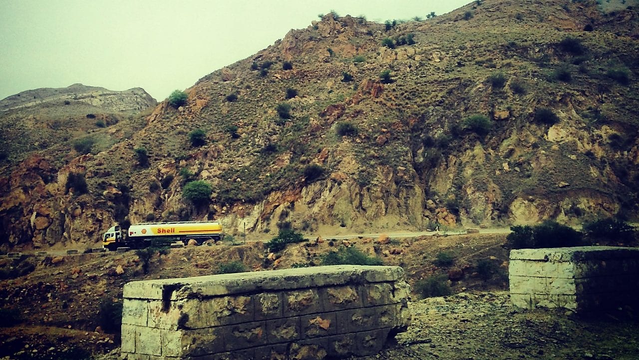 Oil tanker moving on the road