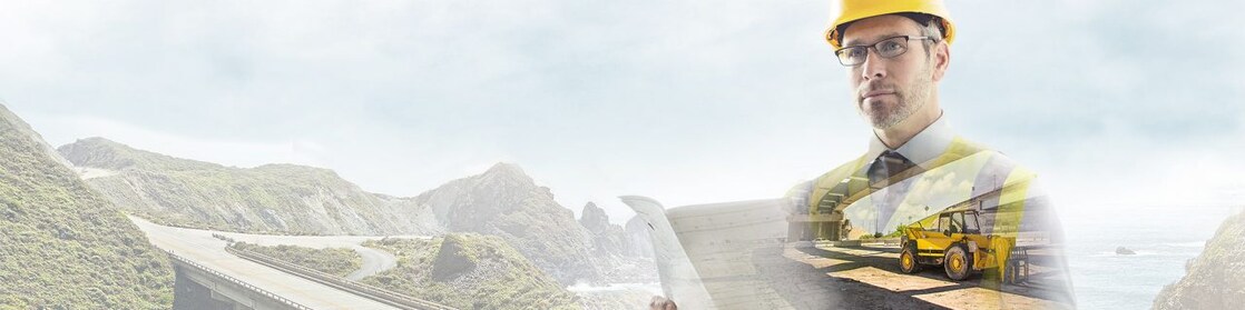  A worker in a yellow hard hat transposed onto a background og a road in some mountains