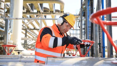 Engineer working on a pipeline