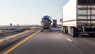 Lorries driving along a road