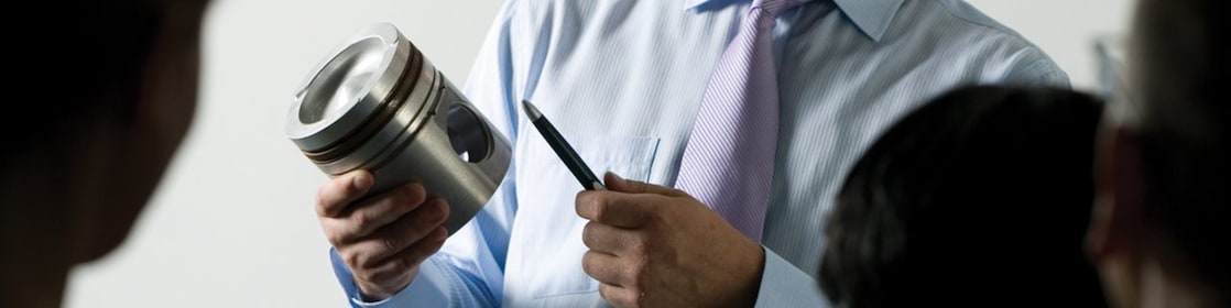 man presenting at a meeting