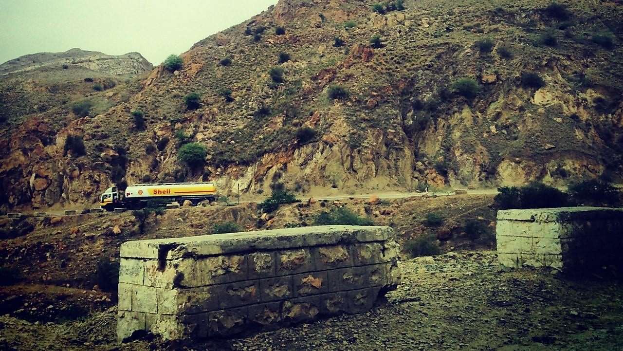 Oil tanker moving on the road