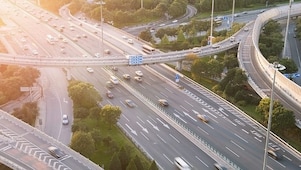Cars driving on a complicated highway infrastructure with over and under passes