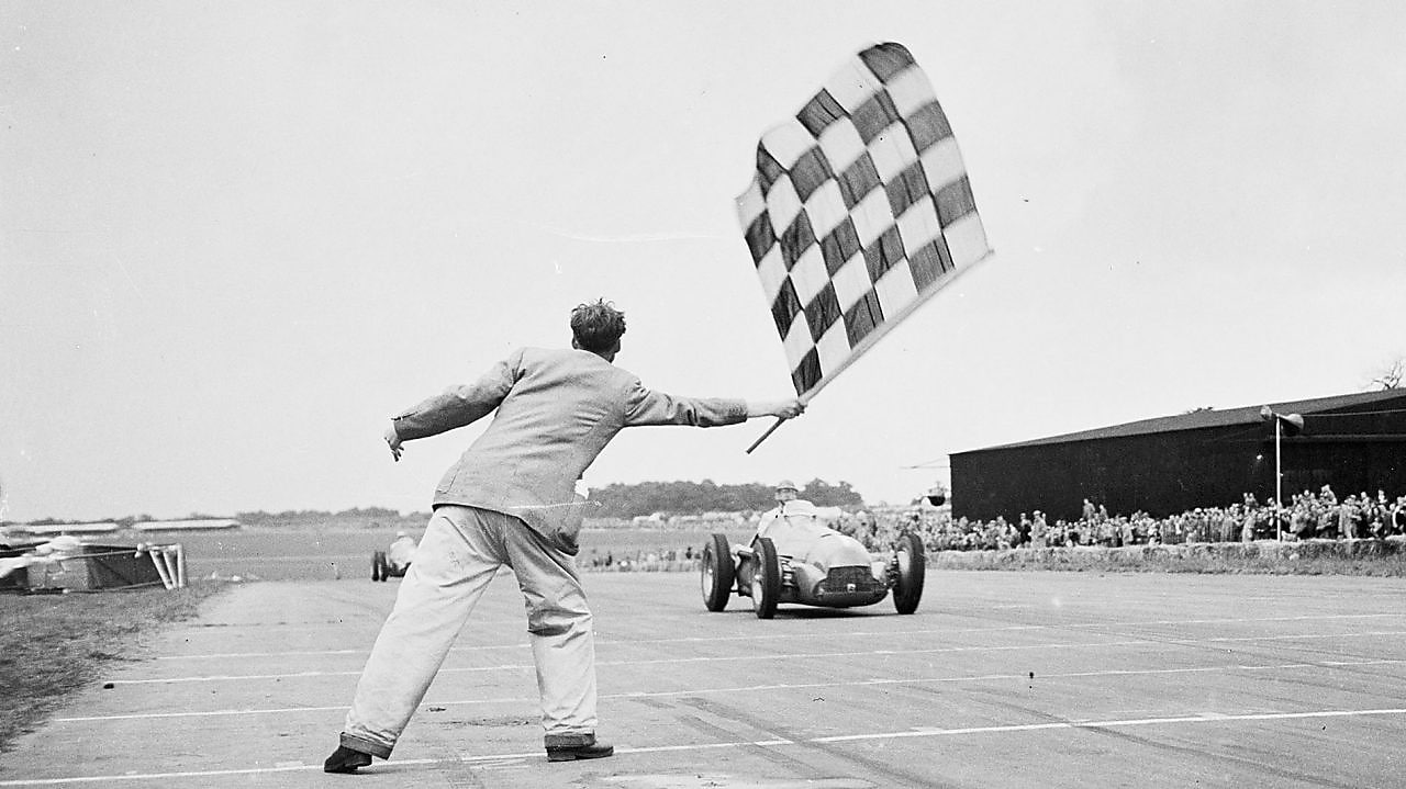 finish line of a car race black and white