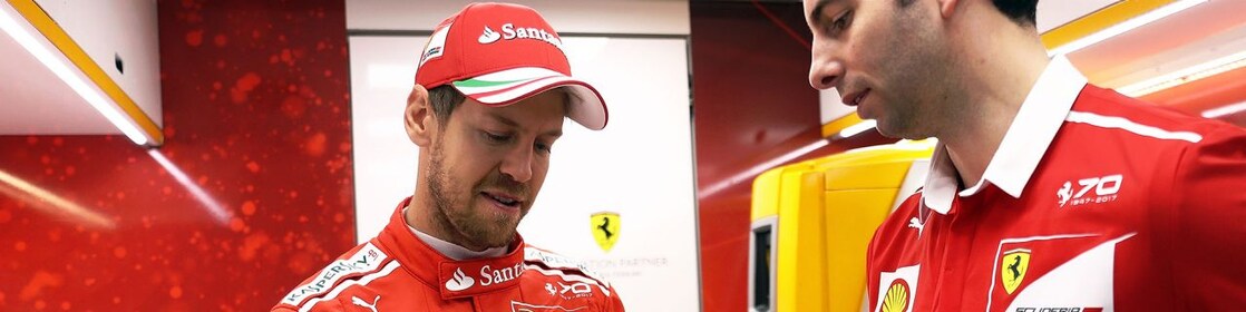 Sebastian Vettel and a Ferrari scientist inside a Shell lab