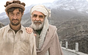 Two men facing in front