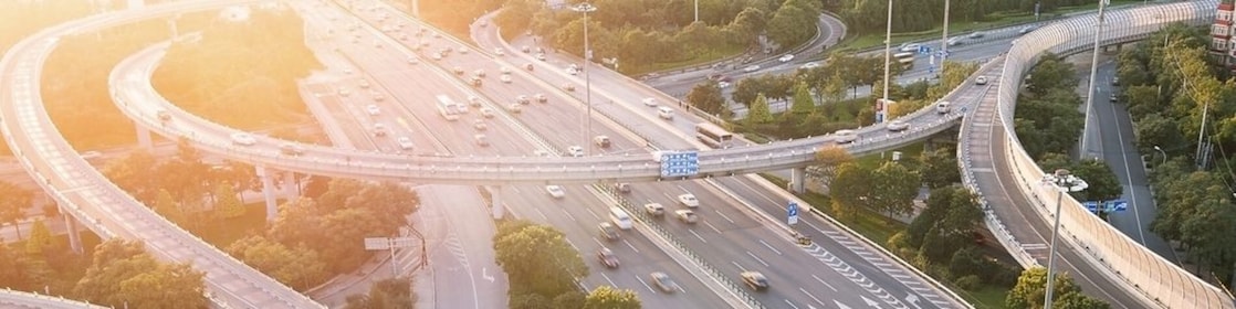Cars driving on a complicated highway infrastructure with over and under passes
