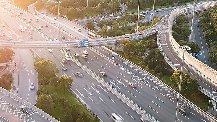 Cars driving on a complicated highway infrastructure with over and under passes