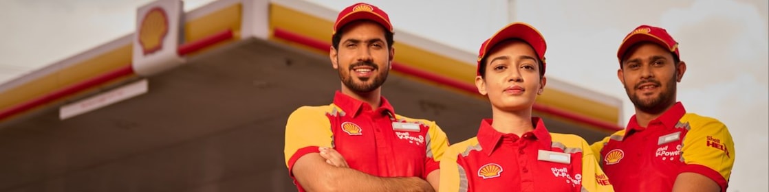 3 people at shell station