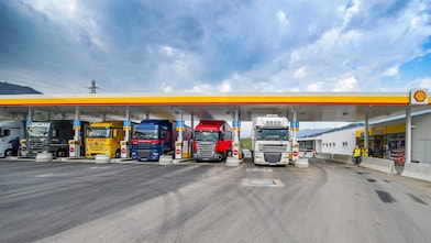 Buses standing at Shell Station